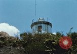 Immagine di Faro francese tower e navi in Cam Ranh Bay Vietnam Cam Ranh Bay Vietnam, 1967, secondo 22 filmato di repertorio 65675023521