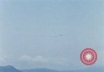 Immagine di Faro francese tower e navi in Cam Ranh Bay Vietnam Cam Ranh Bay Vietnam, 1967, secondo 27 filmato di repertorio 65675023521