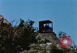 Immagine di Faro francese tower e navi in Cam Ranh Bay Vietnam Cam Ranh Bay Vietnam, 1967, secondo 35 filmato di repertorio 65675023521