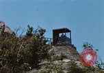 Immagine di Faro francese tower e navi in Cam Ranh Bay Vietnam Cam Ranh Bay Vietnam, 1967, secondo 36 filmato di repertorio 65675023521