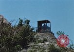 Immagine di Faro francese tower e navi in Cam Ranh Bay Vietnam Cam Ranh Bay Vietnam, 1967, secondo 37 filmato di repertorio 65675023521