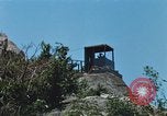 Immagine di Faro francese tower e navi in Cam Ranh Bay Vietnam Cam Ranh Bay Vietnam, 1967, secondo 39 filmato di repertorio 65675023521