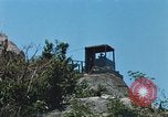 Immagine di Faro francese tower e navi in Cam Ranh Bay Vietnam Cam Ranh Bay Vietnam, 1967, secondo 40 filmato di repertorio 65675023521