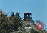 Immagine di Faro francese tower e navi in Cam Ranh Bay Vietnam Cam Ranh Bay Vietnam, 1967, secondo 41 filmato di repertorio 65675023521
