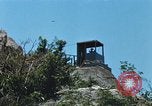 Immagine di Faro francese tower e navi in Cam Ranh Bay Vietnam Cam Ranh Bay Vietnam, 1967, secondo 42 filmato di repertorio 65675023521