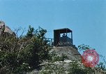 Immagine di Faro francese tower e navi in Cam Ranh Bay Vietnam Cam Ranh Bay Vietnam, 1967, secondo 43 filmato di repertorio 65675023521