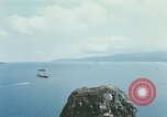 Immagine di Faro francese tower e navi in Cam Ranh Bay Vietnam Cam Ranh Bay Vietnam, 1967, secondo 56 filmato di repertorio 65675023521