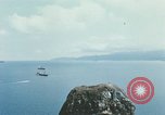 Immagine di Faro francese tower e navi in Cam Ranh Bay Vietnam Cam Ranh Bay Vietnam, 1967, secondo 57 filmato di repertorio 65675023521