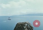 Immagine di Faro francese tower e navi in Cam Ranh Bay Vietnam Cam Ranh Bay Vietnam, 1967, secondo 58 filmato di repertorio 65675023521