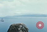 Immagine di Faro francese tower e navi in Cam Ranh Bay Vietnam Cam Ranh Bay Vietnam, 1967, secondo 59 filmato di repertorio 65675023521