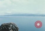 Immagine di Faro francese tower e navi in Cam Ranh Bay Vietnam Cam Ranh Bay Vietnam, 1967, secondo 60 filmato di repertorio 65675023521