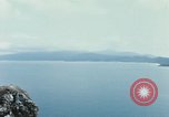 Immagine di Faro francese tower e navi in Cam Ranh Bay Vietnam Cam Ranh Bay Vietnam, 1967, secondo 61 filmato di repertorio 65675023521