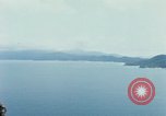 Immagine di Faro francese tower e navi in Cam Ranh Bay Vietnam Cam Ranh Bay Vietnam, 1967, secondo 62 filmato di repertorio 65675023521