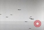 Immagine di Corazzata tedesca Tirpitz bombardato da RAF Tromso Norvegia, 1944, secondo 56 filmato di repertorio 65675023523