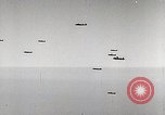 Immagine di Corazzata tedesca Tirpitz bombardato da RAF Tromso Norvegia, 1944, secondo 58 filmato di repertorio 65675023523