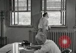 Standbild Männer im Amt United States USA, 1950, aus Sekunde 48 historischem Filmmaterial Videoclip 65675023556