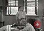 Standbild Männer im Amt United States USA, 1950, aus Sekunde 59 historischem Filmmaterial Videoclip 65675023556