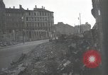 Image of American soldiers fire rifles at snipers in a building Leipzig Germany, 1945, second 3 stock footage video 65675023570