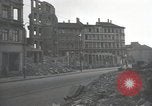 Image of American soldiers fire rifles at snipers in a building Leipzig Germany, 1945, second 4 stock footage video 65675023570