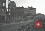 Image of American soldiers fire rifles at snipers in a building Leipzig Germany, 1945, second 5 stock footage video 65675023570