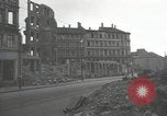 Image of American soldiers fire rifles at snipers in a building Leipzig Germany, 1945, second 6 stock footage video 65675023570