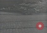 Image of American soldiers fire rifles at snipers in a building Leipzig Germany, 1945, second 7 stock footage video 65675023570
