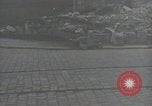 Image of American soldiers fire rifles at snipers in a building Leipzig Germany, 1945, second 8 stock footage video 65675023570