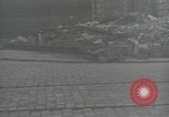 Image of American soldiers fire rifles at snipers in a building Leipzig Germany, 1945, second 10 stock footage video 65675023570
