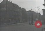 Image of American soldiers fire rifles at snipers in a building Leipzig Germany, 1945, second 11 stock footage video 65675023570