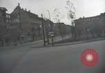 Image of American soldiers fire rifles at snipers in a building Leipzig Germany, 1945, second 13 stock footage video 65675023570
