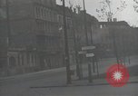 Image of American soldiers fire rifles at snipers in a building Leipzig Germany, 1945, second 15 stock footage video 65675023570