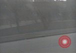 Image of American soldiers fire rifles at snipers in a building Leipzig Germany, 1945, second 16 stock footage video 65675023570