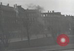 Image of American soldiers fire rifles at snipers in a building Leipzig Germany, 1945, second 17 stock footage video 65675023570