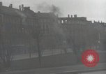 Image of American soldiers fire rifles at snipers in a building Leipzig Germany, 1945, second 18 stock footage video 65675023570