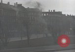 Image of American soldiers fire rifles at snipers in a building Leipzig Germany, 1945, second 19 stock footage video 65675023570