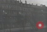Image of American soldiers fire rifles at snipers in a building Leipzig Germany, 1945, second 20 stock footage video 65675023570