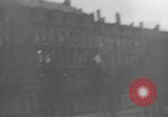 Image of American soldiers fire rifles at snipers in a building Leipzig Germany, 1945, second 21 stock footage video 65675023570