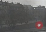 Image of American soldiers fire rifles at snipers in a building Leipzig Germany, 1945, second 24 stock footage video 65675023570