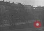 Image of American soldiers fire rifles at snipers in a building Leipzig Germany, 1945, second 25 stock footage video 65675023570