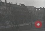 Image of American soldiers fire rifles at snipers in a building Leipzig Germany, 1945, second 26 stock footage video 65675023570