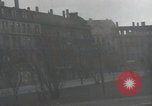 Image of American soldiers fire rifles at snipers in a building Leipzig Germany, 1945, second 27 stock footage video 65675023570