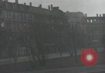 Image of American soldiers fire rifles at snipers in a building Leipzig Germany, 1945, second 28 stock footage video 65675023570