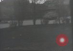 Image of American soldiers fire rifles at snipers in a building Leipzig Germany, 1945, second 29 stock footage video 65675023570