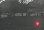 Image of American soldiers fire rifles at snipers in a building Leipzig Germany, 1945, second 31 stock footage video 65675023570
