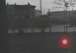 Image of American soldiers fire rifles at snipers in a building Leipzig Germany, 1945, second 33 stock footage video 65675023570