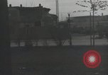 Image of American soldiers fire rifles at snipers in a building Leipzig Germany, 1945, second 34 stock footage video 65675023570
