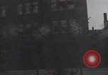 Image of American soldiers fire rifles at snipers in a building Leipzig Germany, 1945, second 36 stock footage video 65675023570