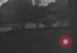 Image of American soldiers fire rifles at snipers in a building Leipzig Germany, 1945, second 38 stock footage video 65675023570