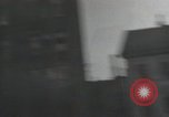 Image of American soldiers fire rifles at snipers in a building Leipzig Germany, 1945, second 39 stock footage video 65675023570