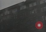 Image of American soldiers fire rifles at snipers in a building Leipzig Germany, 1945, second 42 stock footage video 65675023570